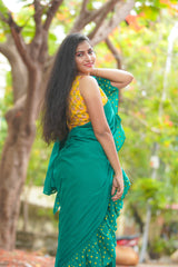 Green mul cotton block printed ruffles saree