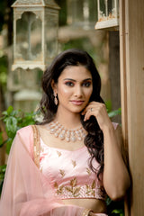 Peach Hand embroidered net lehenga