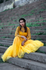 Yellow pearl net Skirt and blouse