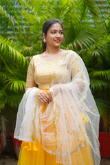 Yellow pearl net lehenga