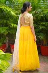 Yellow pearl net lehenga
