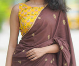 Brown mul cotton block printed saree