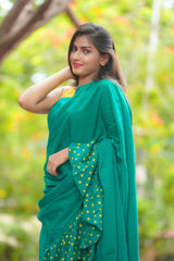 Green mul cotton block printed ruffles saree