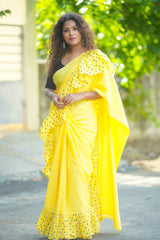 Yellow mul cotton block print ruffle saree