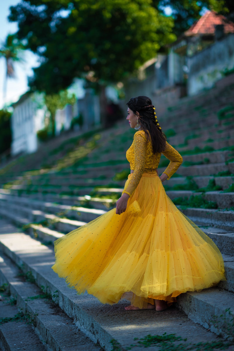 Yellow pearl net Skirt and blouse