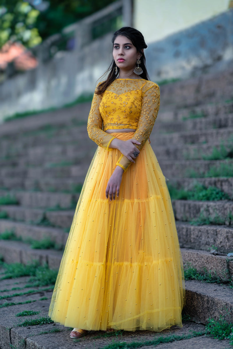 Yellow pearl net Skirt and blouse